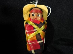 3.5'' CELLULOID NATIVE BABY PAPOOSE SKOOKUMS, PLAID BLANKET, CRADLE BOARD